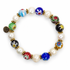 Millefiore with Freshwater Pearls on white studio background