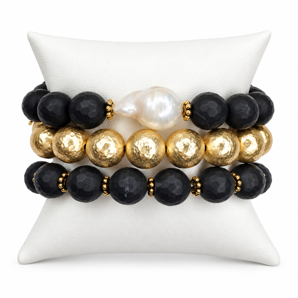 Golden Aura Armparty on white studio background