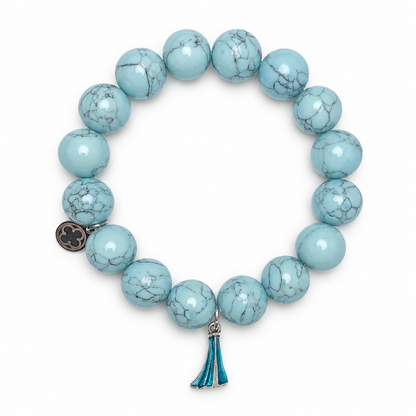 Sky Blue Howlite with Elsa  Pendant on white studio background