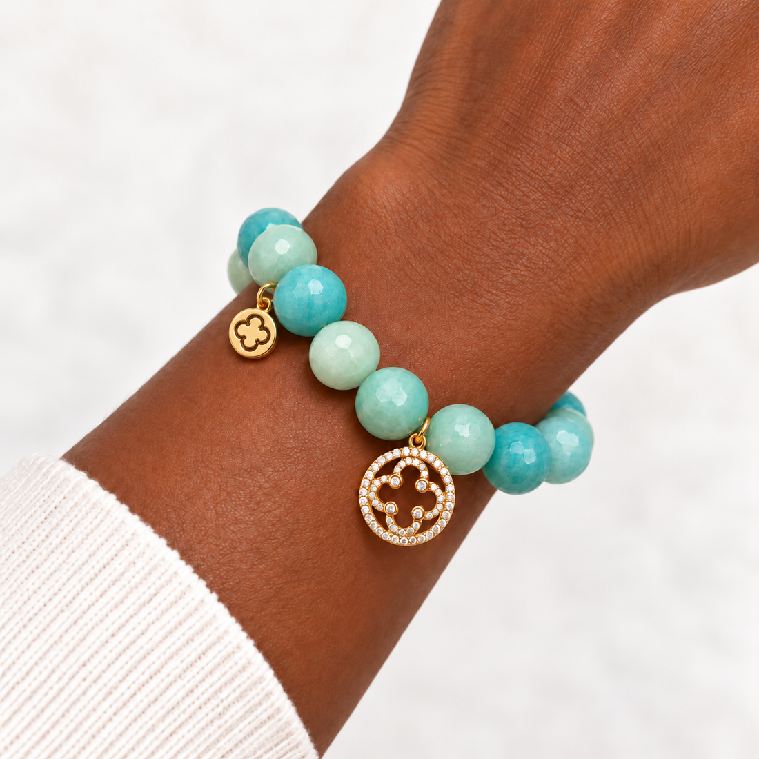 Amazonite Light with Pavé Gold Signature Logo worn on a woman&
