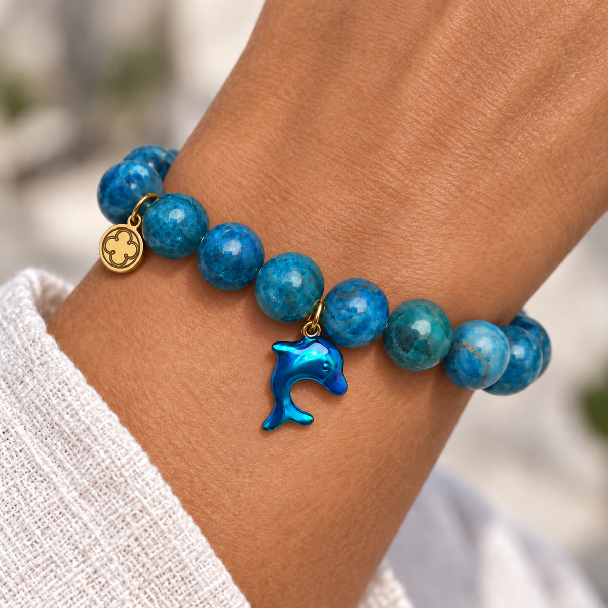 Blue Apatite with Dolphin Pendant worn on a woman&