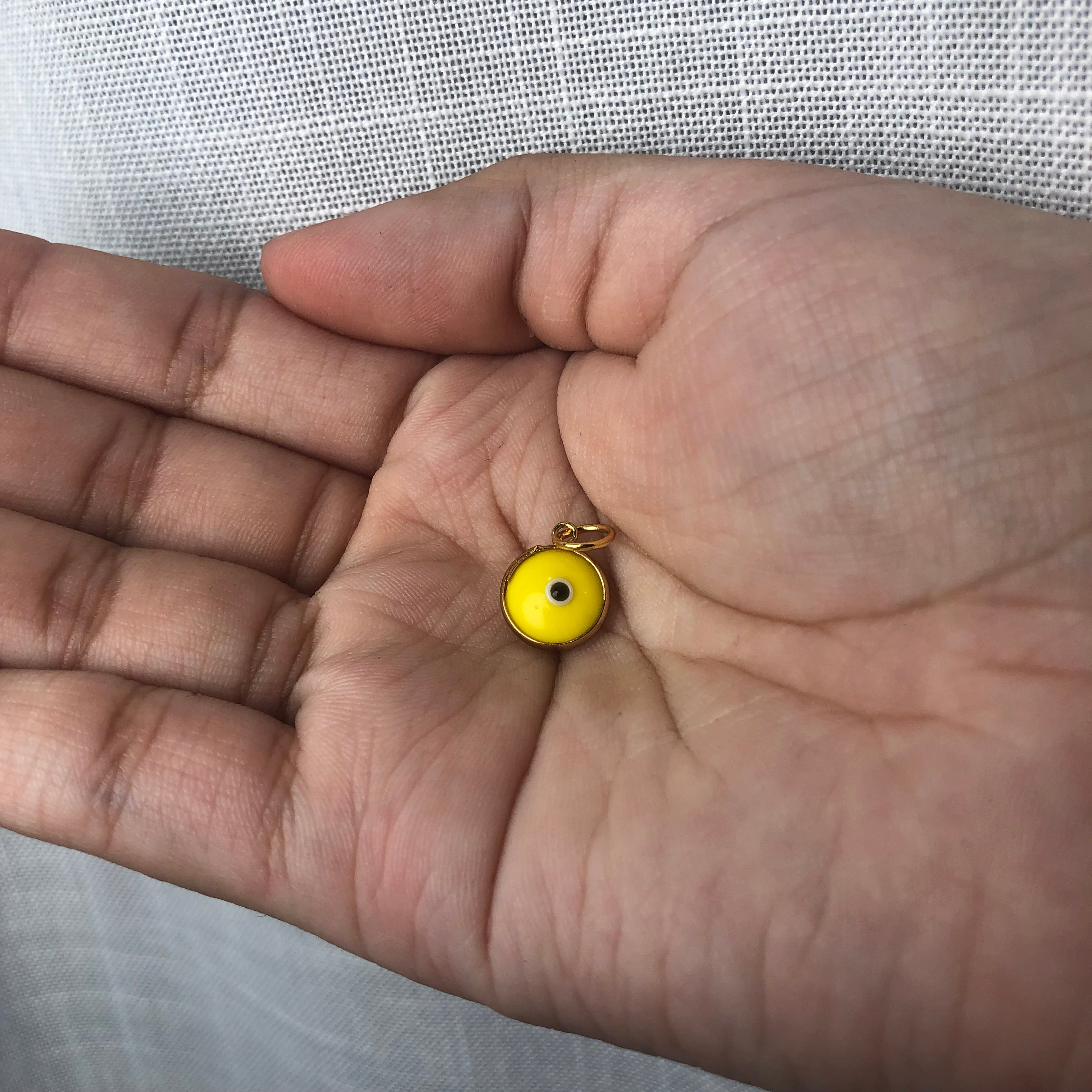 Yellow Glass Evil Eye Pendant