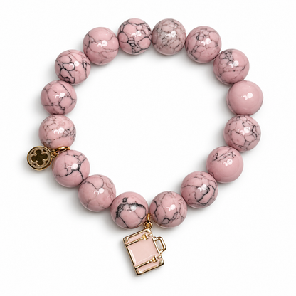 Light Pink Howlite with Pink Luggage Pendant on white studio background