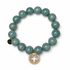 Persian Blue Jade with Pavé Gold Signature Logo on white studio background
