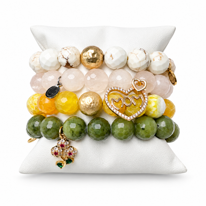 Happy Mums Day Arm Party on a white studio background