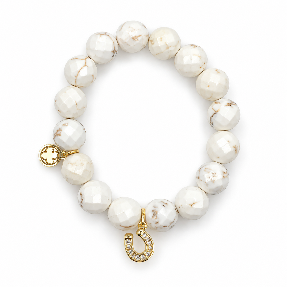 White Magnesite with Pavé Gold Horseshoe Pendant on white studio background