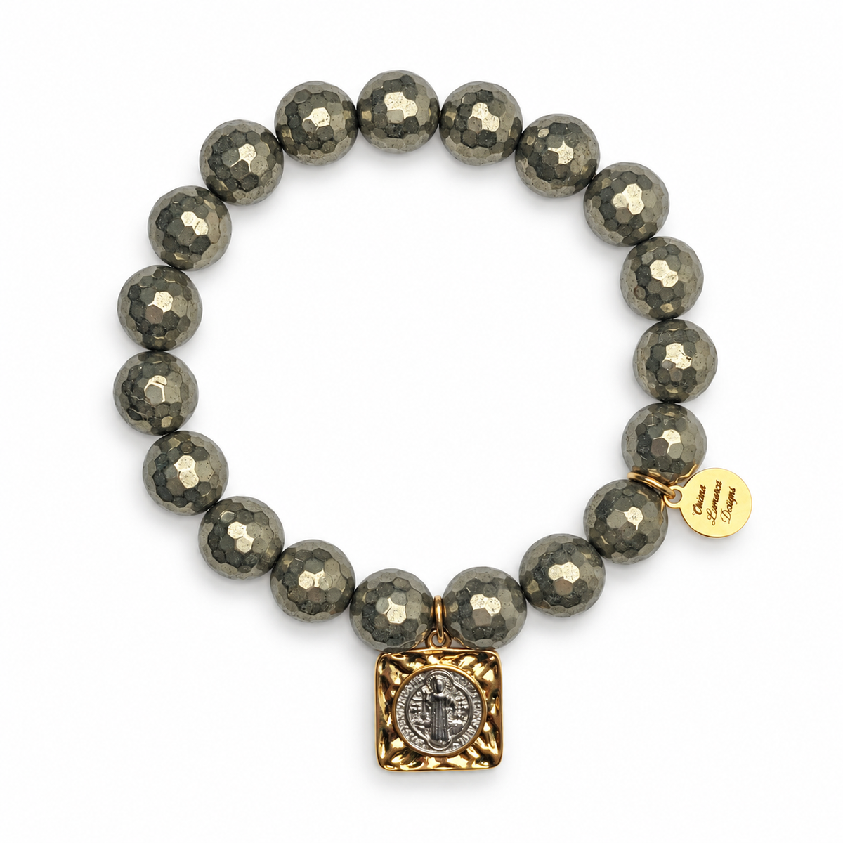 Pyrite with St. Benedict Pendant on white studio background