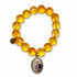 Citrine with St. Gerard Pendant on white studio background