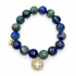Azurite with Pavé Gold Signature Logo on white studio background