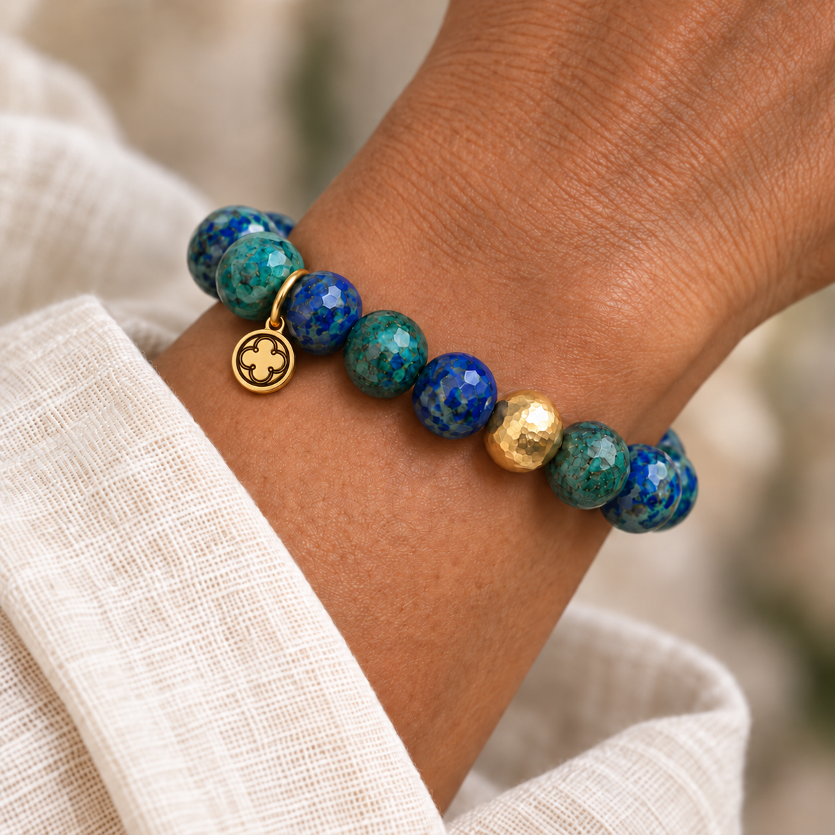 Azurite with Hammered Gold Accent worn on a woman&
