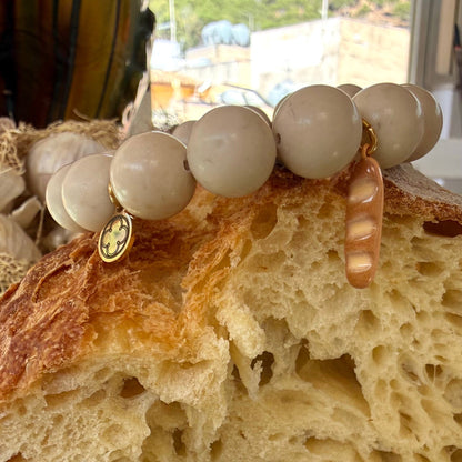 Beige Riverstone with Enamel Bread Loaf Pendant
