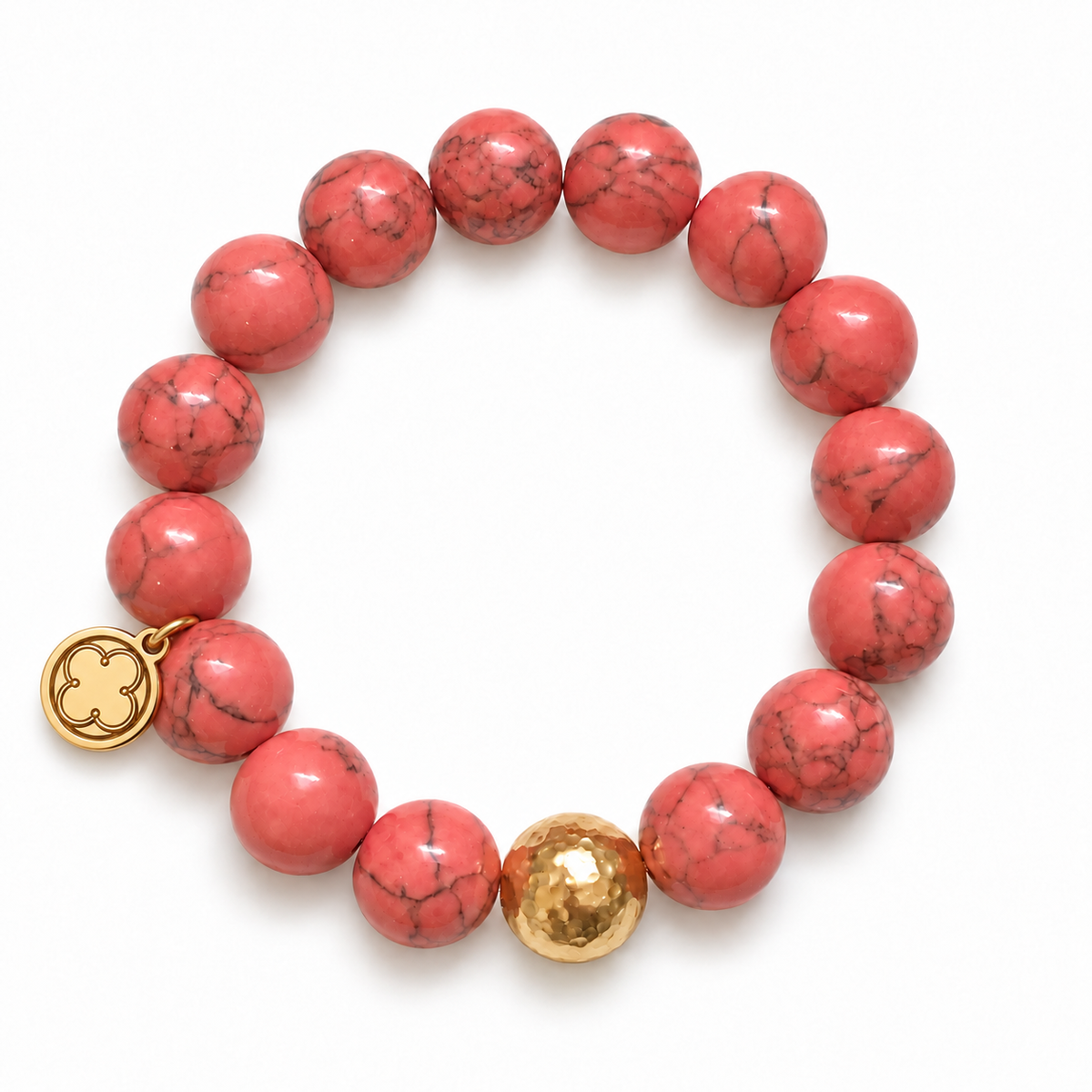 Coral Pink Howlite with Hammered Gold Accent with signature logo tag between the third and fourth beads