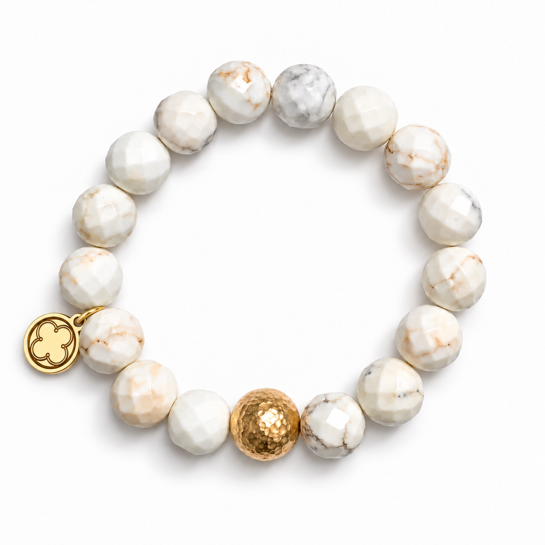 White Magnesite with Hammered Gold Accent with signature logo tag between the third and fourth beads